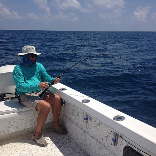 Fighting an Pink Salmon on a Lake Michigan fishing charter