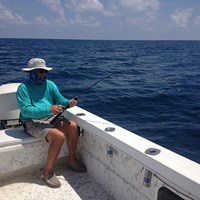 Fighting an Pink Salmon on a Lake Michigan fishing charter