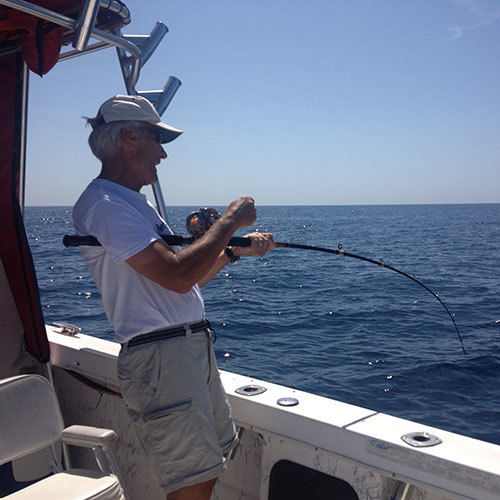 Reeling in an Pink Salmon Reeling in Pink Salmon on Wisconsin Great Lakes Charter