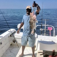Giant Chinook Salmon Hooked on Milwaukee Great Lakes Charter