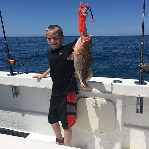 Kid Catches First Chinook Salmon on Milwaukee Great Lakes Charter