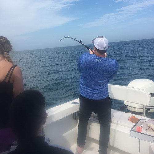 Fighting a Brown Trout Fight Against a Brown Trout Run on Milwaukee Fishing Charter