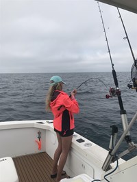 Girl Fighting with Monster Fish near Milwaukee