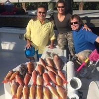 Hauling in a Box of Lake Trout After Great Lakes Charter