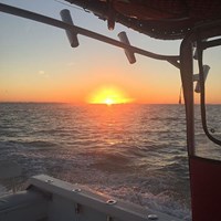 Sun Rising Behind Milwaukee